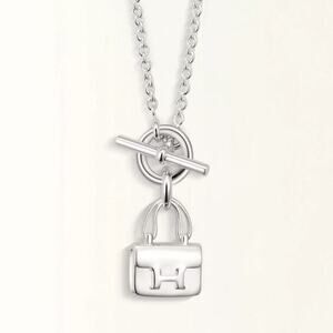 Hermes sterling silver Amulettes Constance necklace pendant